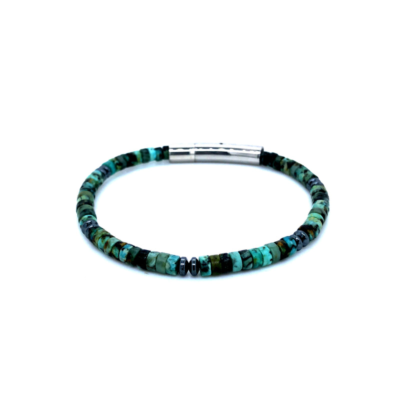 Onatah Gemstone Bracelet Featuring Turquoise Disc Beads And Hematite With A Stainless Steel Clasp Size 19Cms